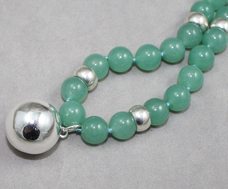 Jade beads and silver ball