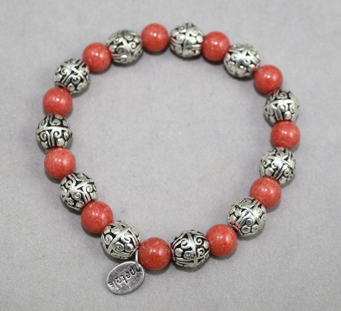 Salmon gemstones bracelet, silver beads