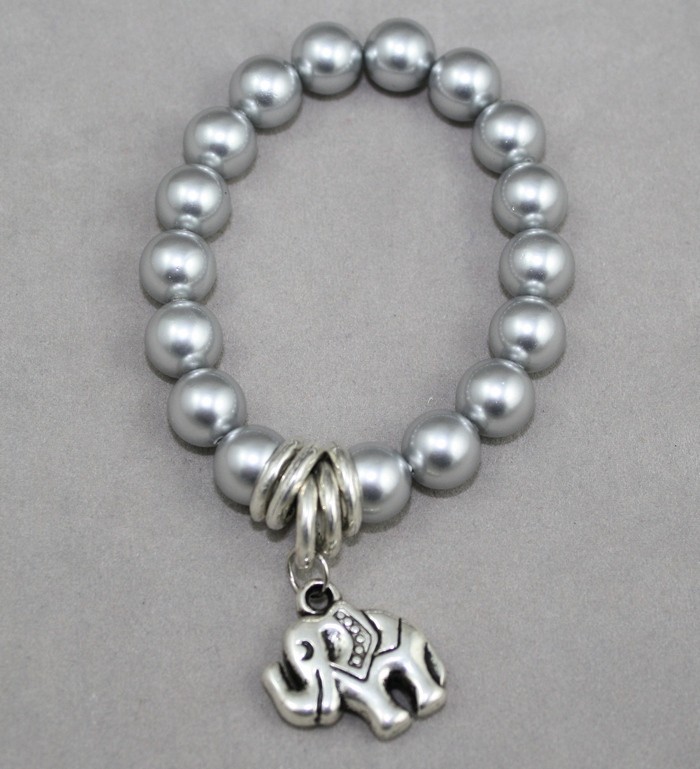 Silver pearls with elephant