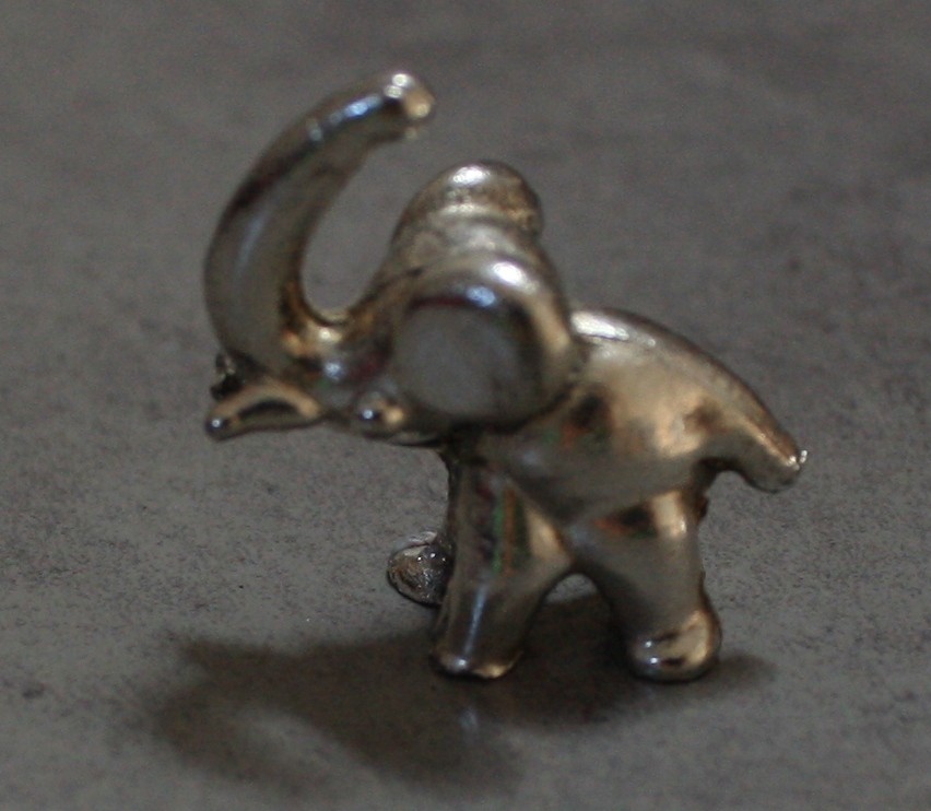 Tiny silver elephant
